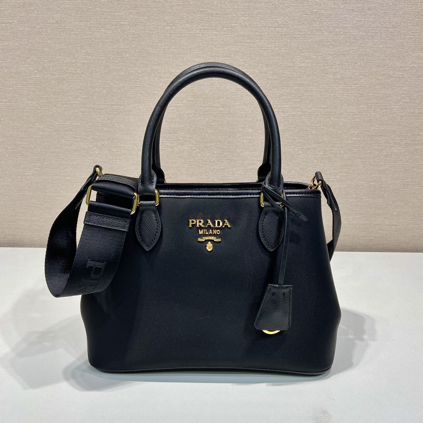 Pra*a top handle bags